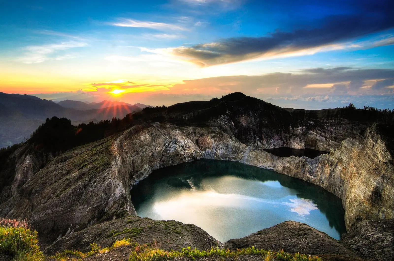 The crater lakes of Kelimutu at sunrise